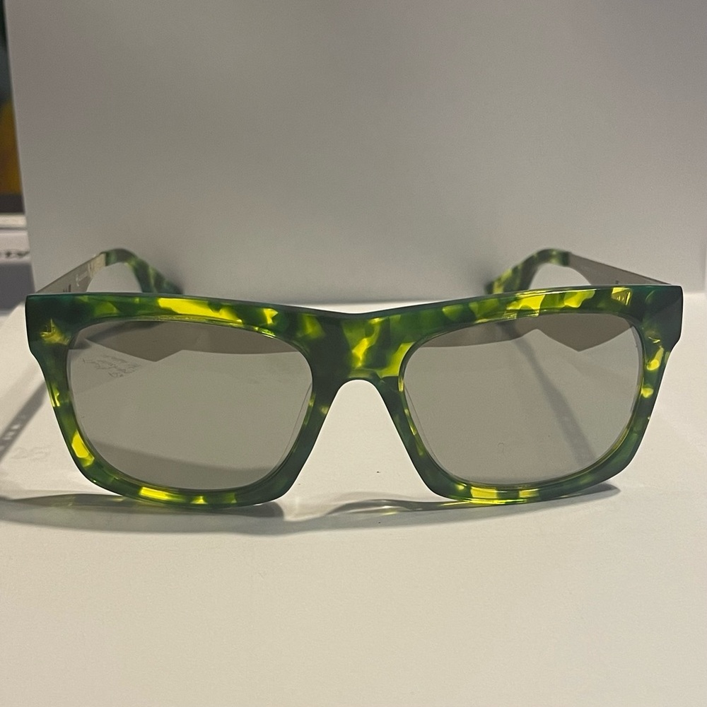 Alexander McQueen green sunglasses razor blade frames